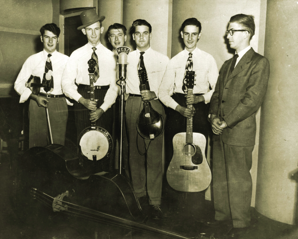 The 1949-1950 lineup of Don Reno and the Tennessee Cut-Ups, on staff at radio station WESC in Greenville, S.C. included (left to right) Jimmy Lunsford, Don Reno, possibly Boomer Pruitt, Bill Haney, Verlon Reno and an unidentified announcer. 
Photo courtesy of the reno family/jeremy stephens collection