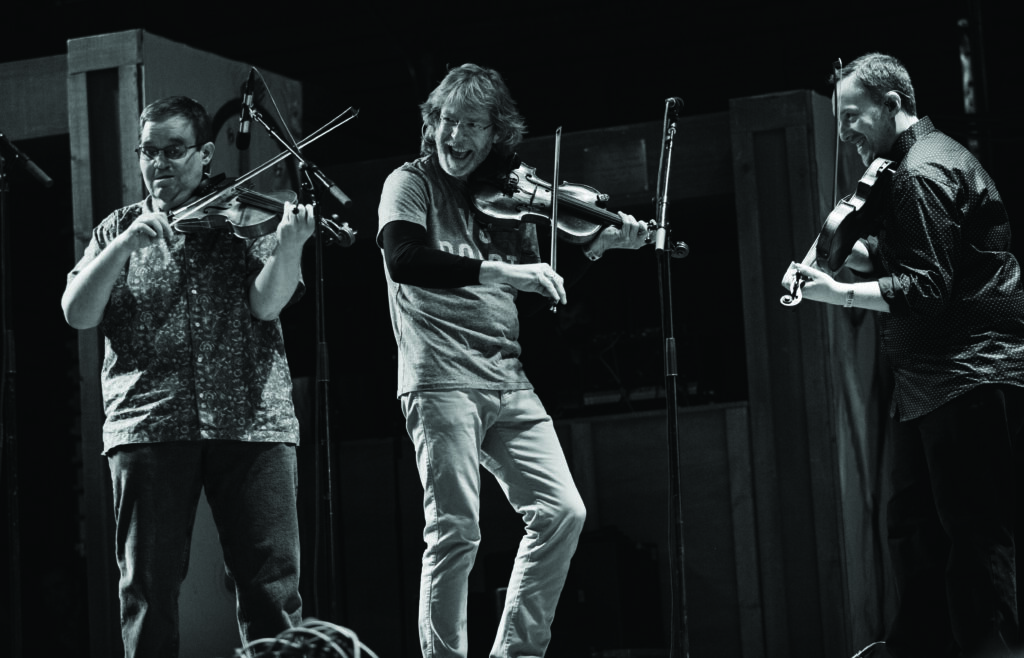 Michael Cleveland, Sam Bush and Justin Moses on stage at Telluride.  Photo by Anthony G Verkuilen