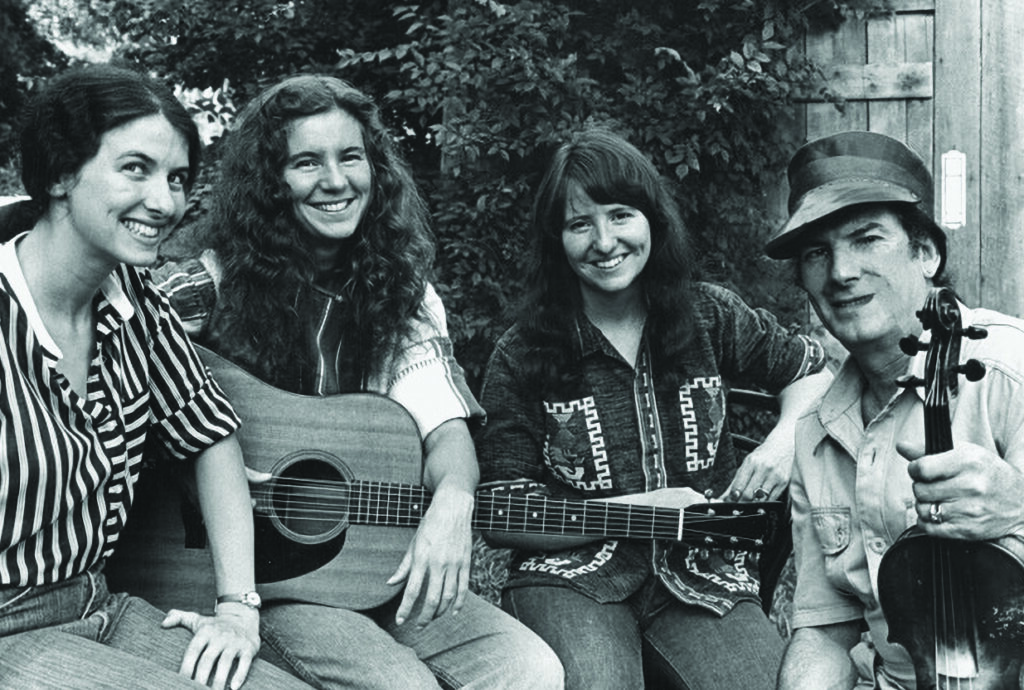 Jim Lunsford with his daughters (left to right) Teresa, Tomi, and Nancy.