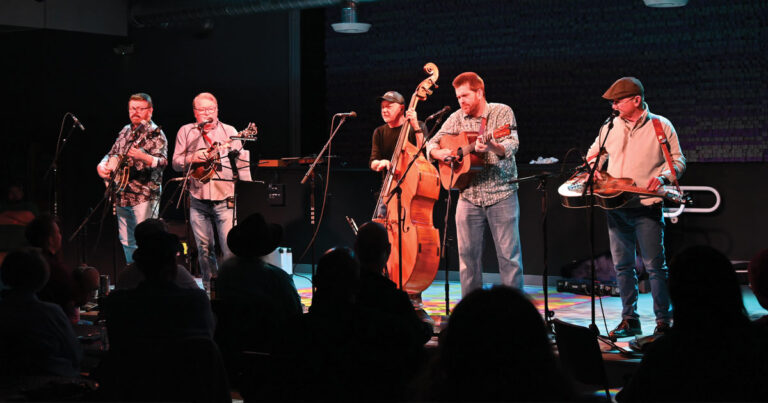 The Seldom Scene (right to left) Ron Stewart, Lou Reid, Ronnie Simpkins, Clay Hess and Fred Travers. | Photo by Kevin Slick