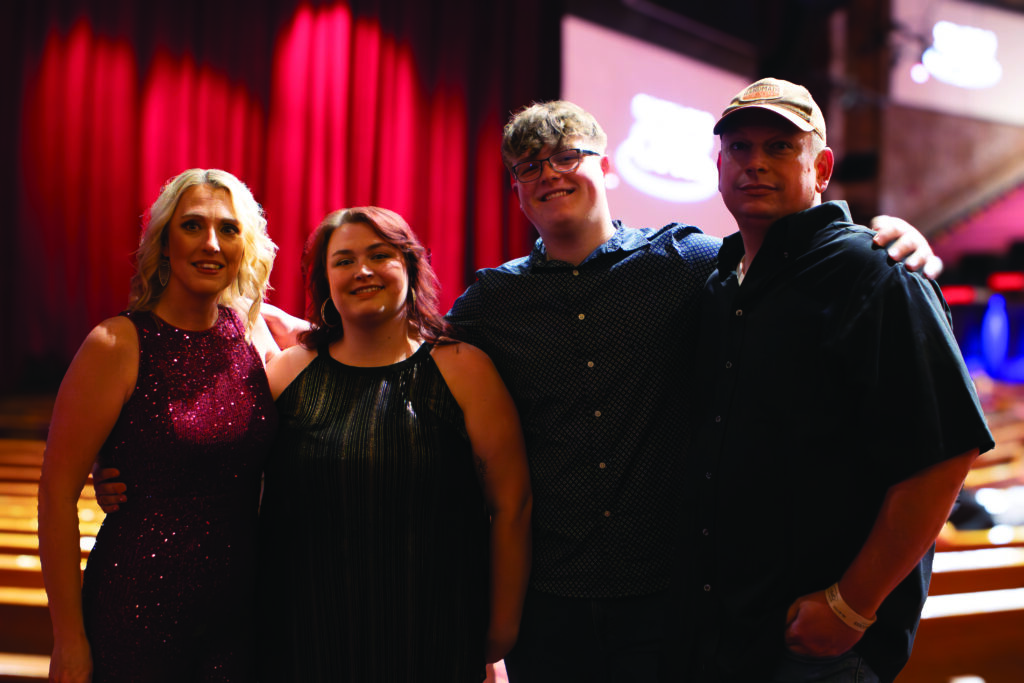 Amanda Cook with her daughter Olivia Cook, son Ethan Cook and husband, Dennis Cook. Photo by Laci Mack