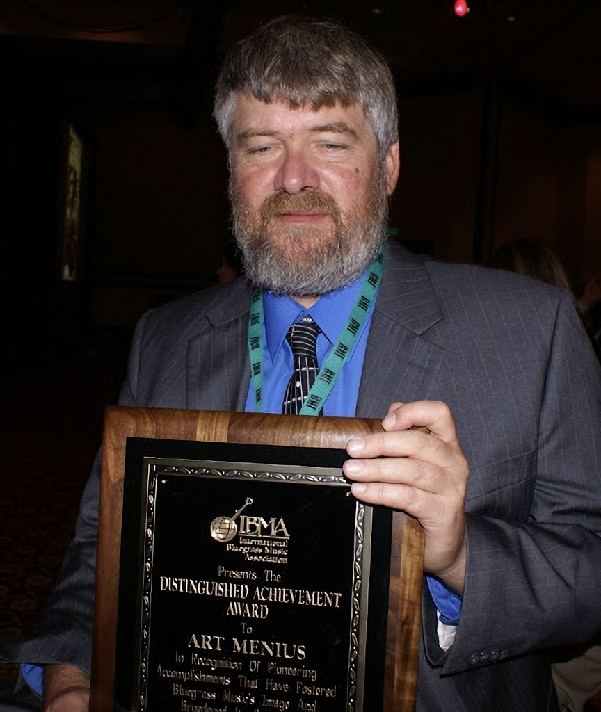 Art Menius was the first Executive Director of the International Bluegrass Music Association.  Here he is shown receivng IBMA’s Distinguished Achievement Award in 2008.