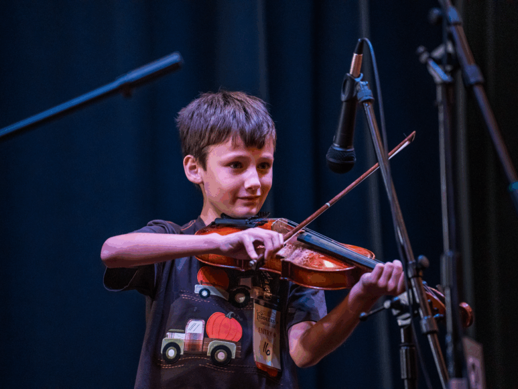 Youth contestant in 2024 Mountain City Fiddlers’ Convention.
Photo by Dustin Nelson