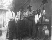 Pendleton “Uncle Pen” Vandiver, Arnold Shultz, Unknown, and Luther Shultz.  Photo Courtesy of Roger Givens.