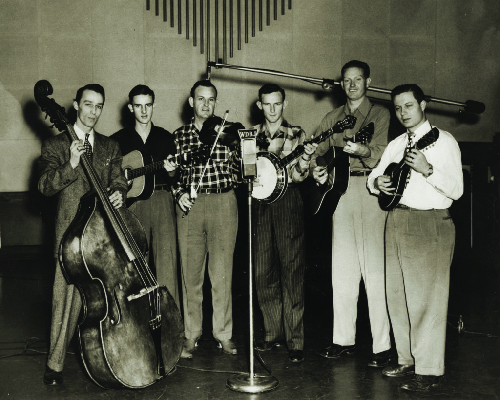 Tommy Magness and the Tennessee Buddies, WDBJ 1950. L-R: Dexter Mills, Verlon Reno, Tommy Magness, Don Reno, Red Smiley, Hal Grant.  Photo Courtesy of Reno Family/Jeremy Stephens Collection