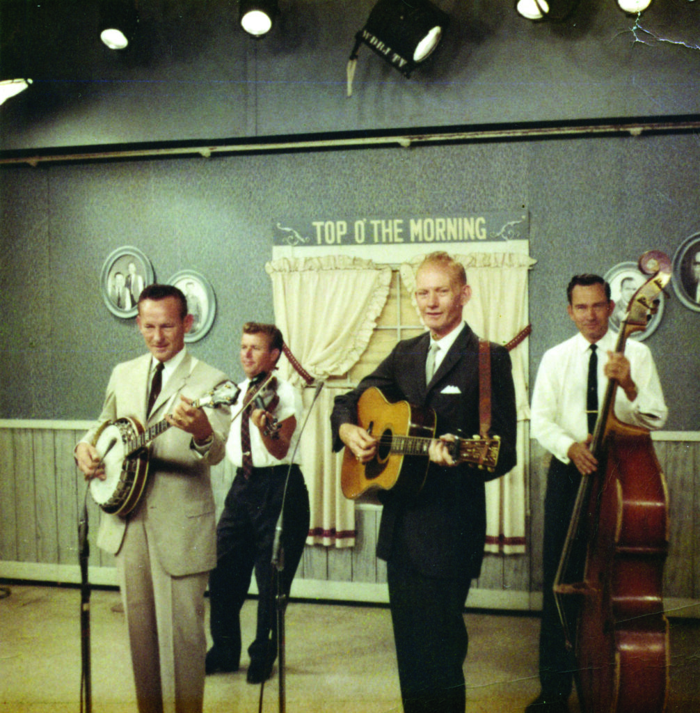 Top O’ the Morning TV set, 1964. (left to right) Don Reno, Mac Magaha, Red Smiley, John Palmer.  Photo Courtesy Ronnie Reno/Jeremy Stephens Collection