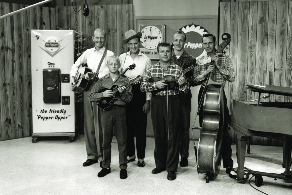 Top O’ Morning TV set, 1959. (left to right) Red Smiley, Ronnie Reno, Don Reno, Mac McMagaha, Steve Chapman and John Palmer. Photo Courtesy George Wells/Jeremy Stephens Collection