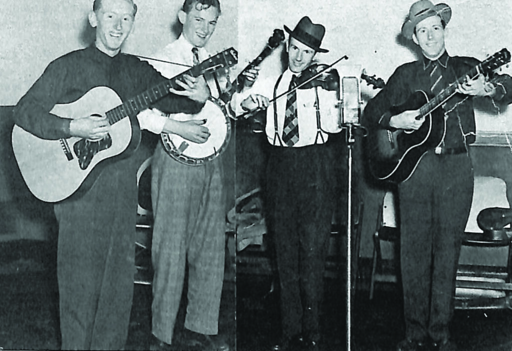 The Morris Brothers in 1940 at WWNC in Asheville, North Carolina (left to right) Howard Thompson, Don Reno, Zeke Morris, Wiley Morris.  Photo from Bluegrass Unlimited Archives