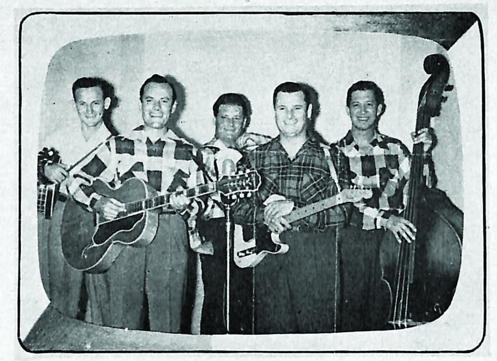 Arthur Smith & the Crackerjacks with Don Reno (far left).  Photo Bluegrass Unlimited Archives.
