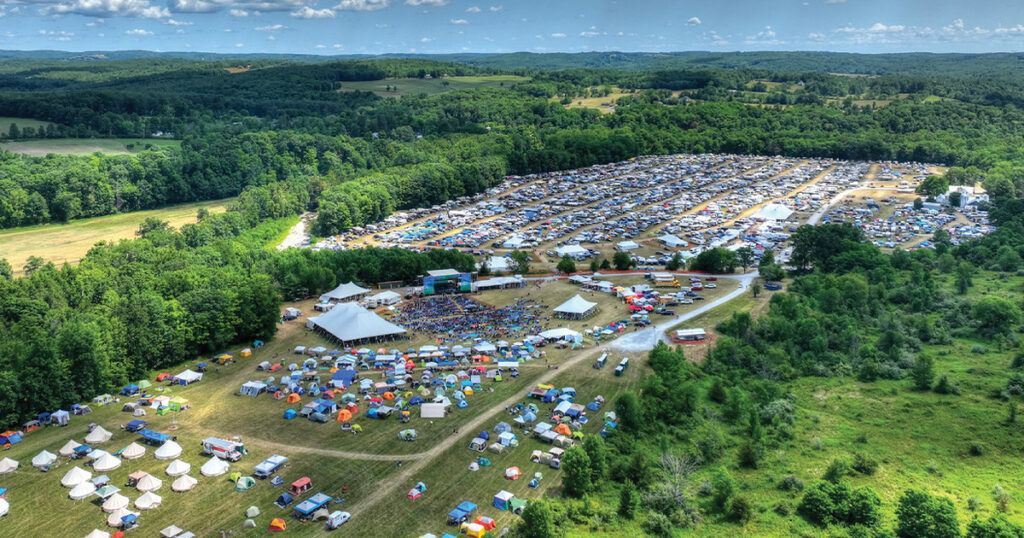 Grey Fox Bluegrass Festival with its Epic Glamping Village in the lower left corner. The tents that look like yurts from the air. Photo by Alan R. Hamilton