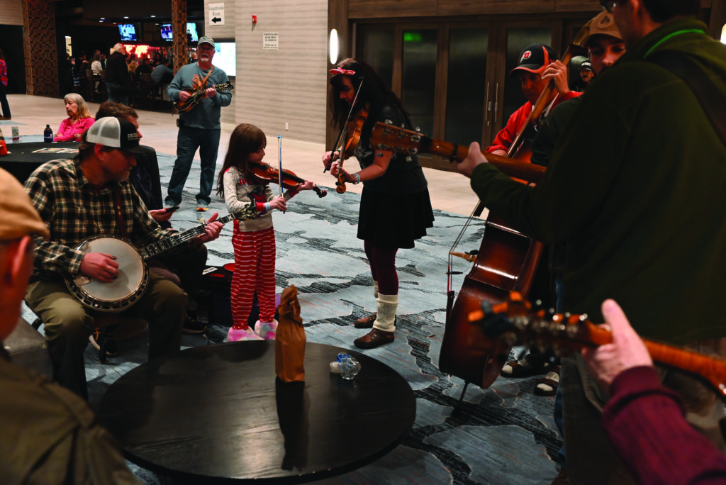 Young and old pickers jamming at Midwinter.