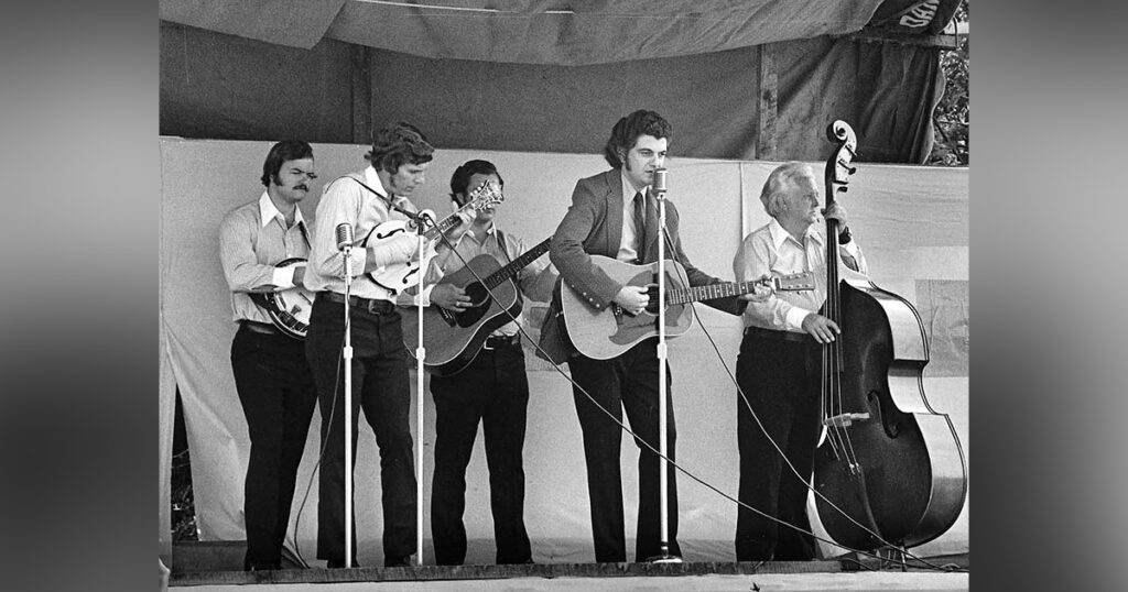 Larry Sparks and the Lonesome Ramblers at Bill Monroe’s Homecoming and Bluegrass Festival, Rosine Kentucky, September 1973. // Photo by Carl Fleischhauer