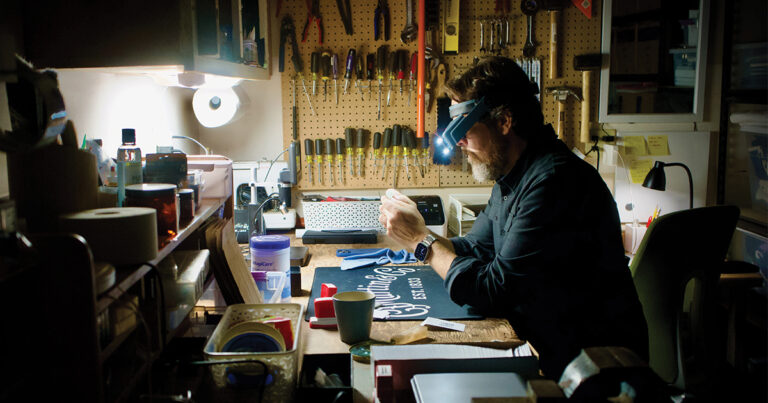 Daniel Flanigan at his workbench // Photo by Joseph McDonough