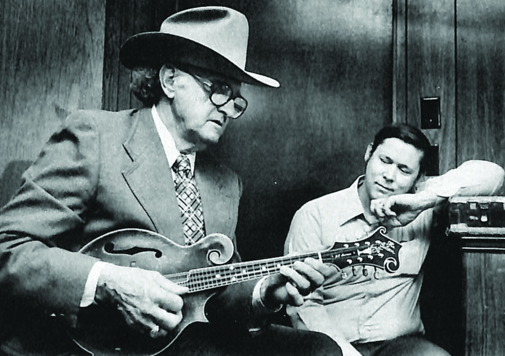Bill Monroe with Gibson’s research and development manager Rendal Wall, 1980. //  Photo by Dan Loftin