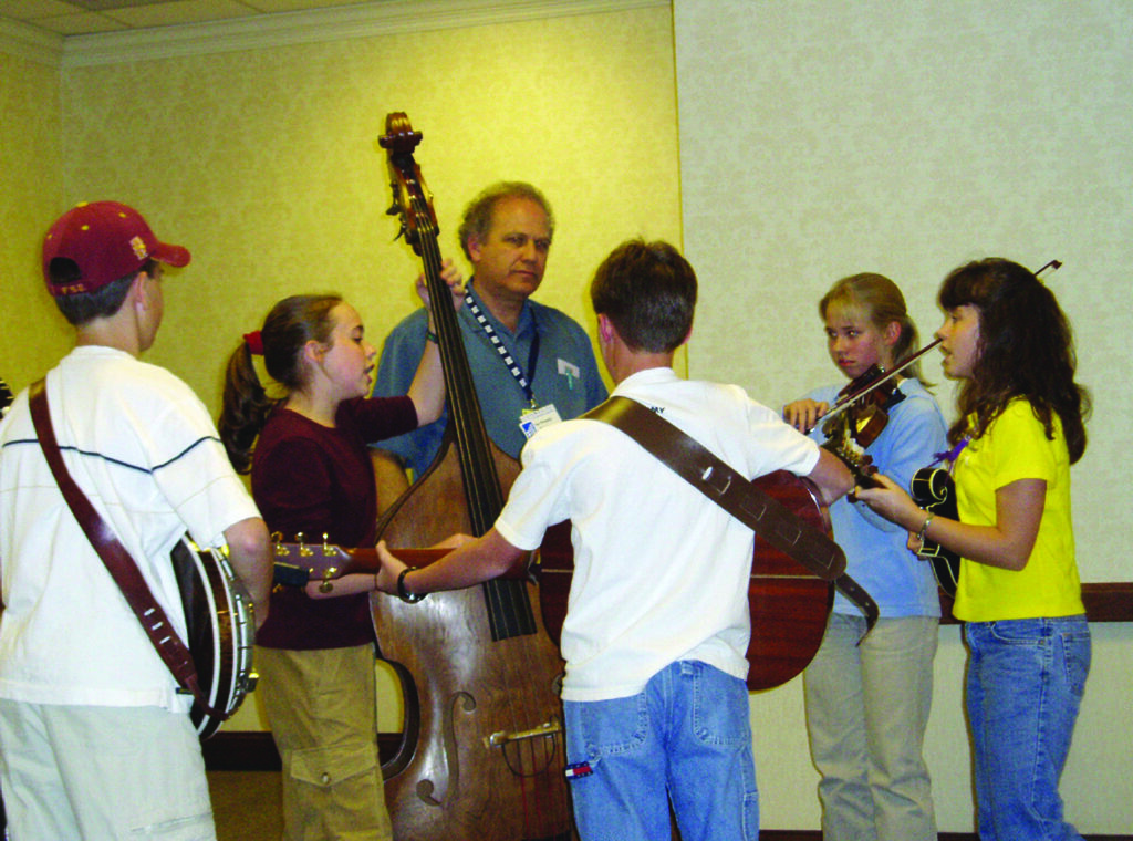 The Young American Bluegrass Idols (IBMA youth band) 2003 rehearsing with Pete Wernick.  (left to right) Cory Walker, Sarah Jarosz, Will Jones, Mary Beth Estes, Sierra Hull.   Photo by Dean Stogdill