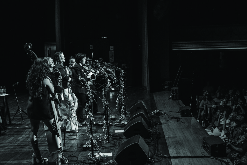 Della Mae at the Ryman, joined by Alison Brown and Sierra Hull. // Photo by Scott Simontacchi.