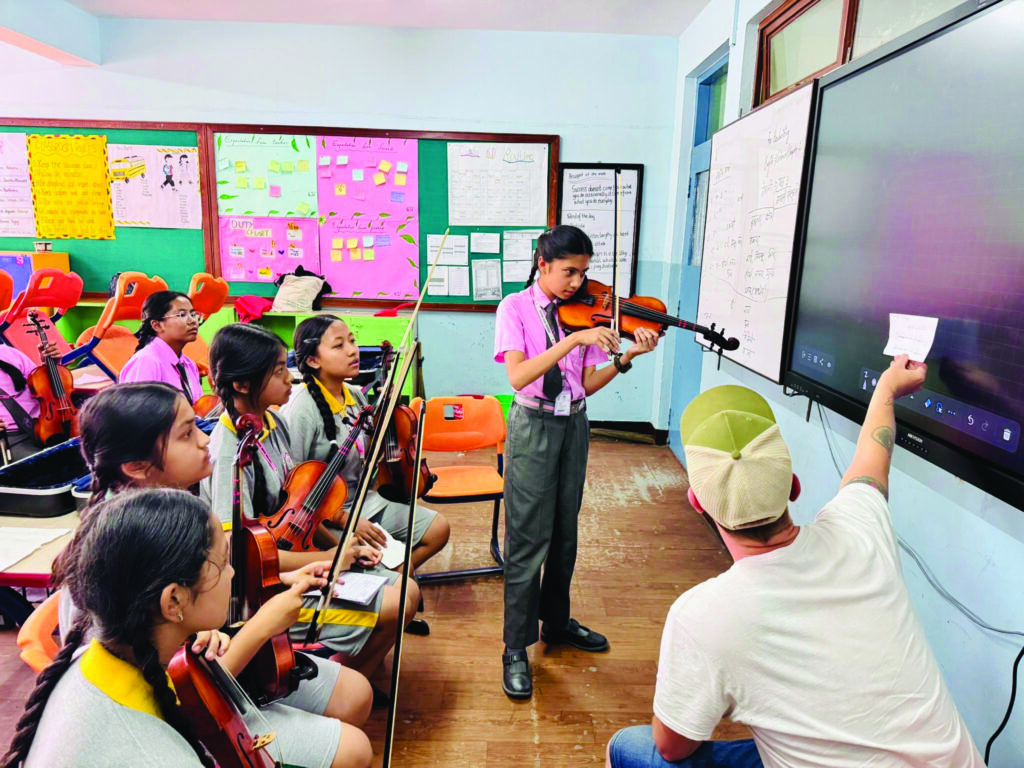 Ben Errington with Bluegrass Journeymen Academy fiddle students