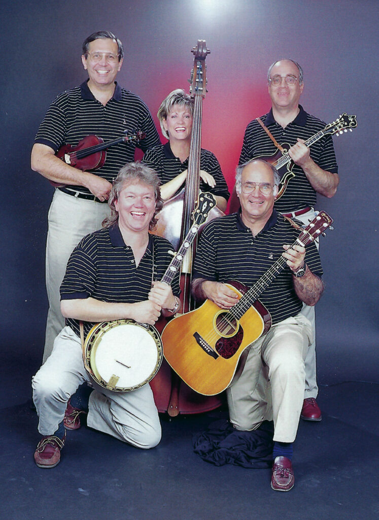 Banjoist Barry Palmer with members of Bluegrass Alliance. Front row, left to right: Barry Palmer and Johnny Martin. Back row, left to right: Chuck Nation, LaRita Buchanan, and Tom Hicks.